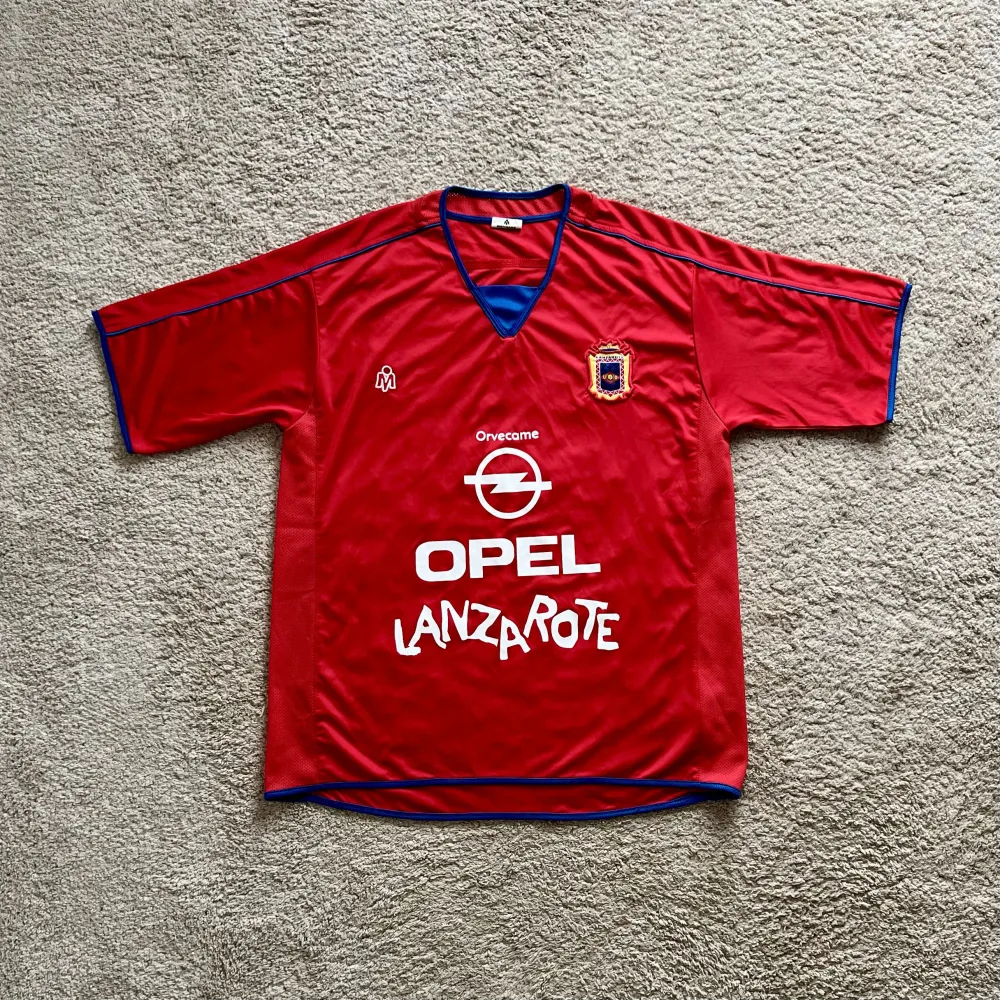 Front view of UD Lanzarote 2010-14 Home Shirt (Opel) - Men's Medium
